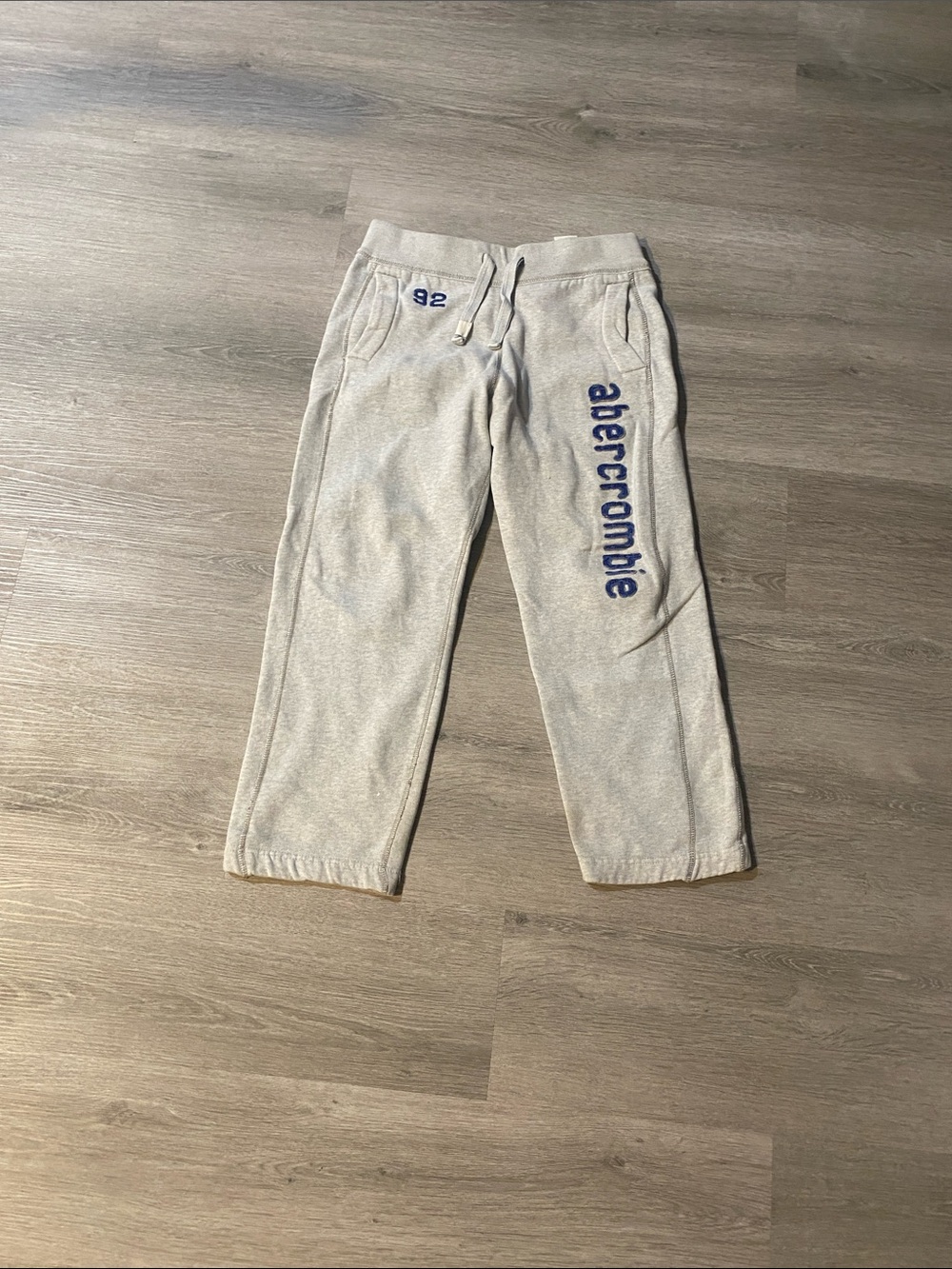 abercrombie kids Cream Sweatpants with Blue Logo Script